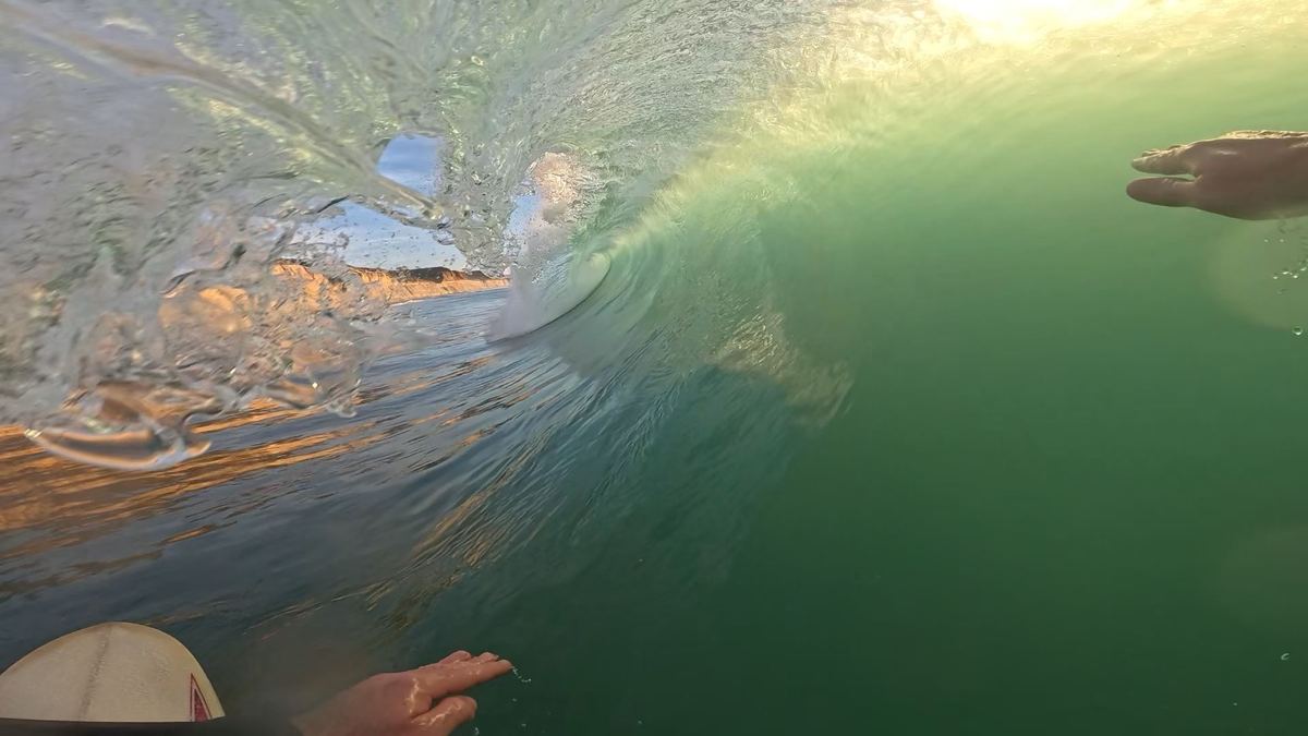Harrison surfing at Torrey Pines State Beach in San Diego, CA